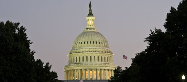 The US Congress building is seen at dusk on the eve of a possible government shutdown as Congress battles out the budget in Washington, DC, September 30, 2013. The US Congress building is seen at dusk on the eve of a possible government shutdown as Congress battles out the budget in Washington, DC, September 30, 2013. - Sputnik International