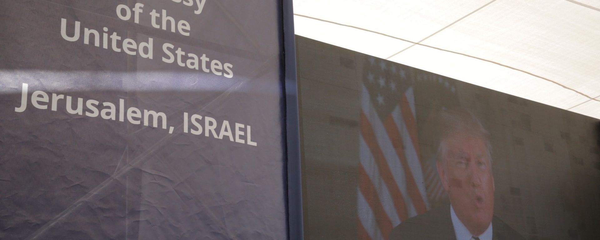 U.S. President Donald Trump is seen on screen as he delivers his speech during the opening ceremony of the new U.S. embassy in Jerusalem, Monday, May 14, 2018 U.S. President Donald Trump is seen on screen as he delivers his speech during the opening ceremony of the new U.S. embassy in Jerusalem, Monday, May 14, 2018 - Sputnik International, 1920, 18.01.2023