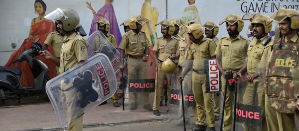 Policemen stand guard near the state secretariat anticipating protests following reports of two women of menstruating age entering the Sabarimala temple, one of the world's largest Hindu pilgrimage sites, in Thiruvananthapuram, Kerala, India, Wednesday, Jan. 2, 2019 Policemen stand guard near the state secretariat anticipating protests following reports of two women of menstruating age entering the Sabarimala temple, one of the world's largest Hindu pilgrimage sites, in Thiruvananthapuram, Kerala, India, Wednesday, Jan. 2, 2019 - Sputnik International