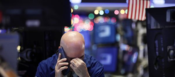 A trader talks on his phone on the floor of the New York Stock Exchange - Sputnik International