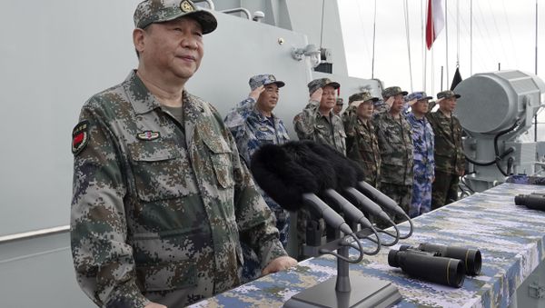In this April 12, 2018 file photo released by Xinhua News Agency, Chinese President Xi Jinping speaks after reviewing the Chinese People's Liberation Army (PLA) Navy fleet in the South China Sea.  - Sputnik International