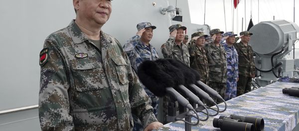 In this April 12, 2018 file photo released by Xinhua News Agency, Chinese President Xi Jinping speaks after reviewing the Chinese People's Liberation Army (PLA) Navy fleet in the South China Sea. In this April 12, 2018 file photo released by Xinhua News Agency, Chinese President Xi Jinping speaks after reviewing the Chinese People's Liberation Army (PLA) Navy fleet in the South China Sea. - Sputnik International