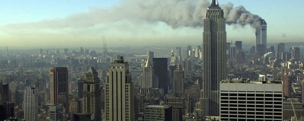 Plumes of smoke pour from the World Trade Center buildings in New York Tuesday, Sept. 11, 2001. Planes crashed into the upper floors of both World Trade Center towers minutes apart Tuesday in a horrific scene of explosions and fires that left gaping holes in the 110-story buildings Plumes of smoke pour from the World Trade Center buildings in New York Tuesday, Sept. 11, 2001. Planes crashed into the upper floors of both World Trade Center towers minutes apart Tuesday in a horrific scene of explosions and fires that left gaping holes in the 110-story buildings - Sputnik International