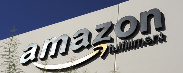 In this Nov. 11, 2010 file photo, the Amazon.com logo adorns an Amazon.com fulfillment center in Goodyear, Ariz., one of several centers in the Phoenix metro area to open in recent years. The issue of whether Amazon.com should be required to collect tax on online sales to Arizonans isn't going away. State legislators considered but ultimately shelved proposals to force the online retailer to collect tax on its sales in Arizona. But the issue is expected to resurface publicly within the next few months when a newly appointed state task force considers making recommendations for legislative action in 2013. In this Nov. 11, 2010 file photo, the Amazon.com logo adorns an Amazon.com fulfillment center in Goodyear, Ariz., one of several centers in the Phoenix metro area to open in recent years. The issue of whether Amazon.com should be required to collect tax on online sales to Arizonans isn't going away. State legislators considered but ultimately shelved proposals to force the online retailer to collect tax on its sales in Arizona. But the issue is expected to resurface publicly within the next few months when a newly appointed state task force considers making recommendations for legislative action in 2013. - Sputnik International
