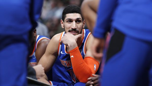 New York Knicks center Enes Kanter jokes with teammates during a timeout the first half of the team's NBA basketball game against the Denver Nuggets on Tuesday, Jan. 1, 2019 - Sputnik International