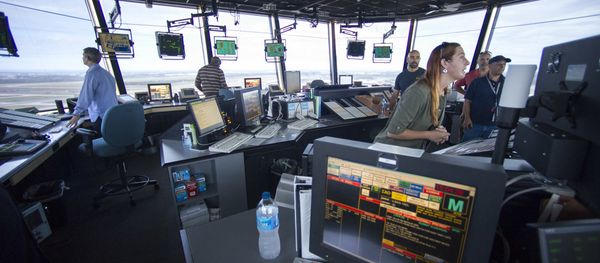 FAA Air Traffic Controllers work in the Dulles International Airport Air Traffic Control Tower in Sterling, Va FAA Air Traffic Controllers work in the Dulles International Airport Air Traffic Control Tower in Sterling, Va - Sputnik International