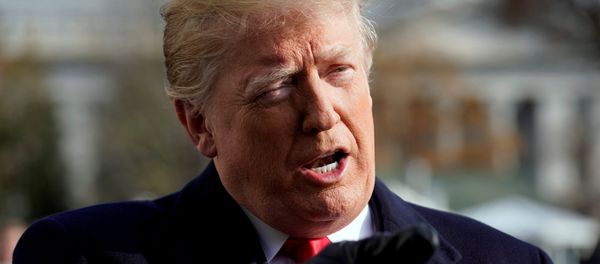 U.S. President Donald Trump talks to the media on the South Lawn of the White House in Washington before his departure for the annual Army-Navy college football game in Philadelphia, U.S., December 8, 2018. REUTERS/Yuri Gripas/File Photo - Sputnik International