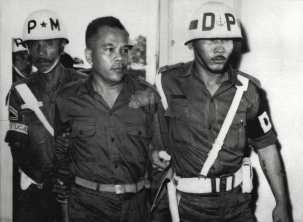 Colonel Untung Syamsuri is led away after his failed coup in Indonesia in 1965. He was later executed Colonel Untung Syamsuri is led away after his failed coup in Indonesia in 1965. He was later executed - Sputnik International