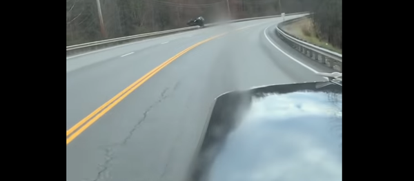 Suspected Drunk Driver Barrels Through US Highway Guard Rail, Survives Suspected Drunk Driver Barrels Through US Highway Guard Rail, Survives - Sputnik International