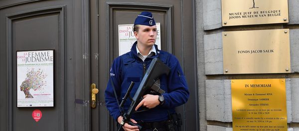 An armed Belgian police officer stands guard outside the Jewish Museum in Brussels after the 2014 attack An armed Belgian police officer stands guard outside the Jewish Museum in Brussels after the 2014 attack - Sputnik International