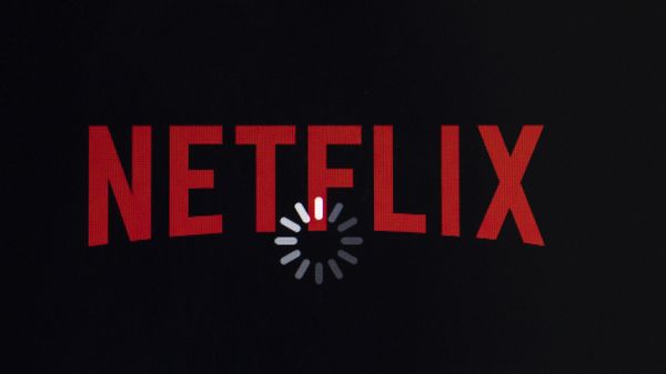 In this July 17, 2017, file photo the Netflix logo is displayed on an iPhone in Philadelphia.  - Sputnik International