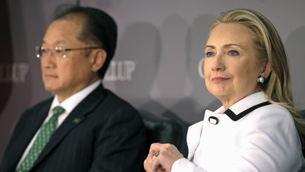 (File photo) World Bank President Jim Yong Kim, left, and Secretary of State Hillary Rodham Clinton wait to address the Gallup Evidence and Impact: Closing the Gender Data Gap conference in Washington, Thursday, July 19, 2012 (File photo) World Bank President Jim Yong Kim, left, and Secretary of State Hillary Rodham Clinton wait to address the Gallup Evidence and Impact: Closing the Gender Data Gap conference in Washington, Thursday, July 19, 2012 - Sputnik International