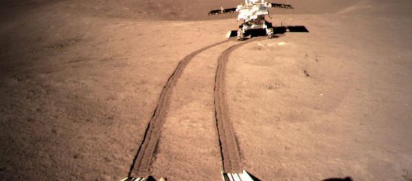 China's lunar rover Yutu-2, or Jade Rabbit 2 rolling onto the far side of the moon taken by the Chang'e-4 lunar probe is seen in this image provided by China National Space Administration January 4, 2019. China's lunar rover Yutu-2, or Jade Rabbit 2 rolling onto the far side of the moon taken by the Chang'e-4 lunar probe is seen in this image provided by China National Space Administration January 4, 2019. - Sputnik International