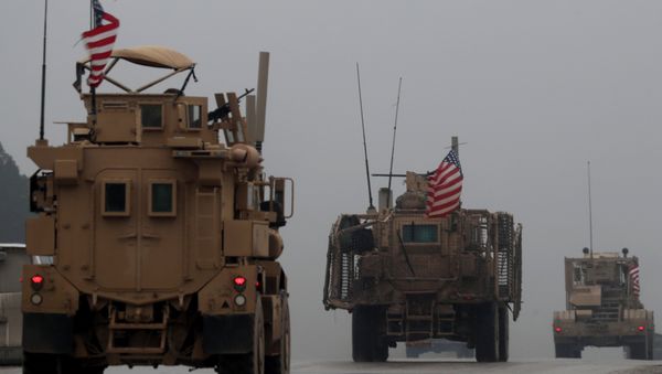 In this file photo taken on December 30, 2018, shows a line of US military vehicles in Syria's northern city of Manbij - Sputnik International