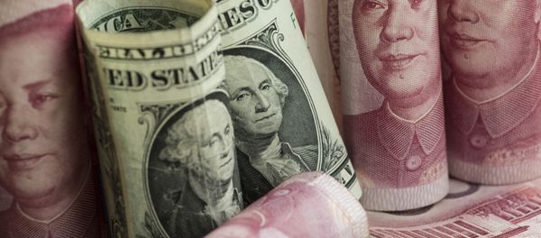 Chinese 100 yuan notes and one US dollar notes in Beijing - Sputnik International