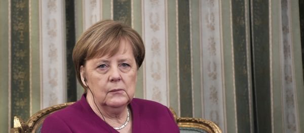 German Chancellor Angela Merkel listens to Greek President during a meeting in Athens on January 11, 2019 - Sputnik International