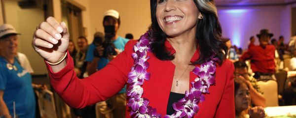 In this Nov. 6, 2018, file photo, Rep. Tulsi Gabbard, D-Hawaii, greets supporters in Honolulu. Gabbard has announced she’s running for president in 2020 - Sputnik International