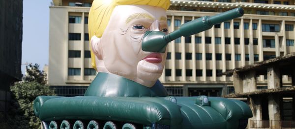 A giant inflatable US President Donald Trump tank sits outside an art exhibition in downtown Beirut, Lebanon, Thursday, Oct. 11, 2018 - Sputnik International