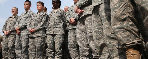 In this Tuesday, Dec. 10, 2013 photo, U.S. troops listen to Secretary of Defense Chuck Hagel, as he speaks at the Al Udeid air base in Qatar.  - Sputnik International