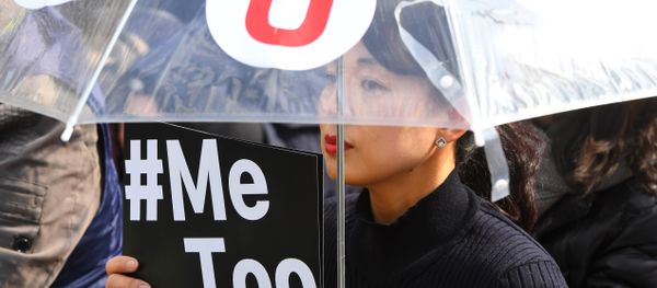 A South Korean demonstrator holds a banner during a rally to mark International Women's Day as part of the country's #MeToo movement in Seoul on March 8, 2018.  - Sputnik International