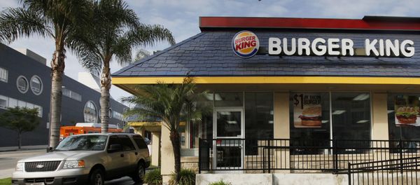 FILE - In this Thursday, April 25, 2013, file photo, a car stops at the drive-thru at a Burger King restaurant near downtown Los Angeles. Restaurant Brands International, the parent company of Burger King and Tim Hortons, reports financial results Monday, Oct. 24, 2016. FILE - In this Thursday, April 25, 2013, file photo, a car stops at the drive-thru at a Burger King restaurant near downtown Los Angeles. Restaurant Brands International, the parent company of Burger King and Tim Hortons, reports financial results Monday, Oct. 24, 2016. - Sputnik International