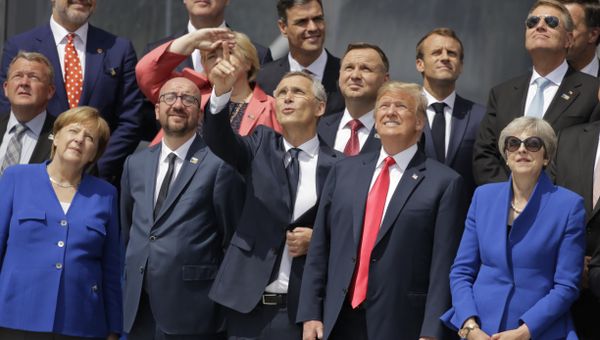 German Chancellor Angela Merkel, Belgian Prime Minister Charles Michel, NATO Secretary-General Jens Stoltenberg, U.S. President Donald Trump and British Prime Minister Theresa May, front row from left, watch a fly-by during a summit of heads of state and government at NATO headquarters in Brussels Wednesday, July 11, 2018. NATO leaders gather in Brussels for a two-day summit to discuss Russia, Iraq and their mission in Afghanistan.  - Sputnik International