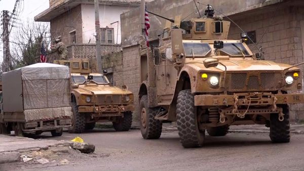 An image grab taken from a video obtained by AFPTV on January 16, 2019, shows US armoured vehicles at the scene of a suicide attack in the northern Syrian town of Manbij An image grab taken from a video obtained by AFPTV on January 16, 2019, shows US armoured vehicles at the scene of a suicide attack in the northern Syrian town of Manbij - Sputnik International