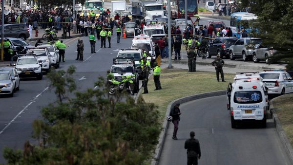 Police and security personnel work at the scene where a car bomb exploded, according to authorities, in Bogota, Colombia January 17, 2019 Police and security personnel work at the scene where a car bomb exploded, according to authorities, in Bogota, Colombia January 17, 2019 - Sputnik International