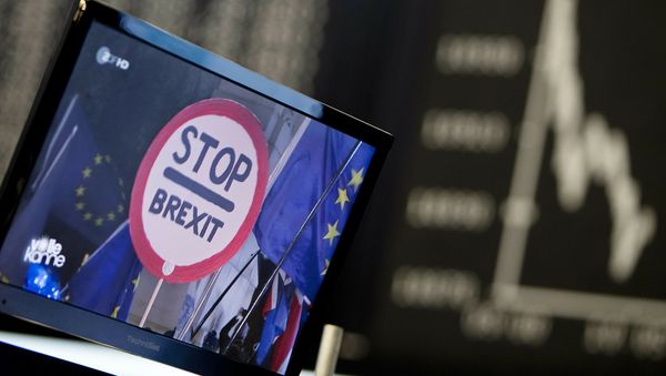 A computer screen shows news about the Brexit as the curve of the German stock index DAX is seen at the stock market in Frankfurt, Germany, Wednesday, Jan. 16, 2019 - Sputnik International