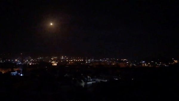 What is believed to be guided missiles are seen in the sky during what is reported to be an attack in Damascus, Syria, January 21, 2019, in this still image taken from a video obtained from social media What is believed to be guided missiles are seen in the sky during what is reported to be an attack in Damascus, Syria, January 21, 2019, in this still image taken from a video obtained from social media - Sputnik International