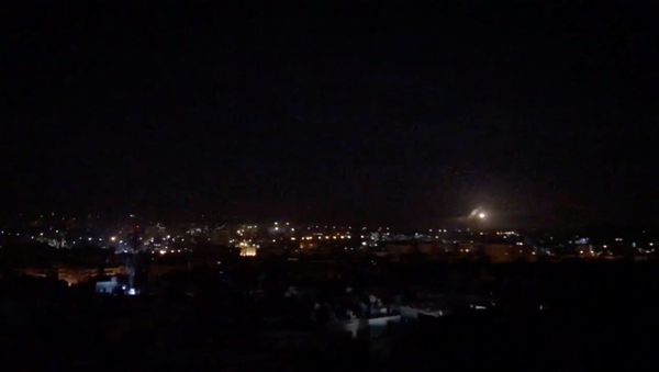 What is believed to be guided missiles are seen in the sky during what is reported to be an attack in Damascus, Syria, January 21, 2019, in this still image taken from a video obtained from social media What is believed to be guided missiles are seen in the sky during what is reported to be an attack in Damascus, Syria, January 21, 2019, in this still image taken from a video obtained from social media - Sputnik International