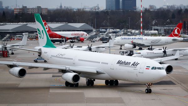 An Airbus A340-300 of Iranian airline Mahan Air taxis at Duesseldorf airport DUS, Germany January 16, 2019 - Sputnik International