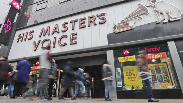 People pass an HMV shop in London People pass an HMV shop in London - Sputnik International