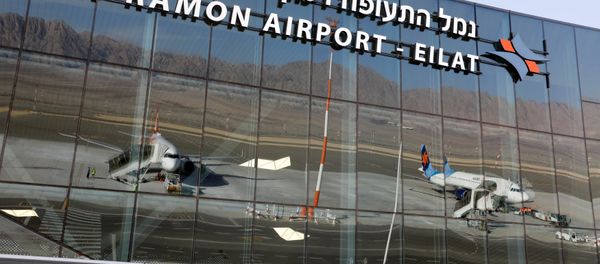 Planes are reflected in the facade of the Ramon International Airport after an inauguration ceremony for the new airport, just outside the southern Red Sea resort city of Eilat, Israel January 21, 2019. - Sputnik International