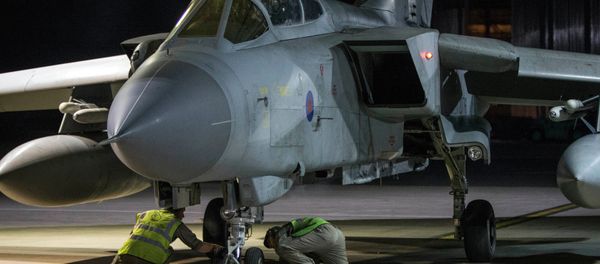 RAF Tornado taxis into its hangar after conducting strikes on 14 April 2018 in Syria - Sputnik International