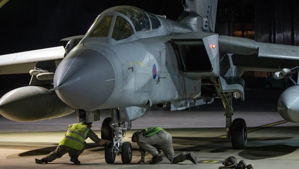 RAF Tornado taxis into its hangar after conducting strikes on 14 April 2018 in Syria - Sputnik International
