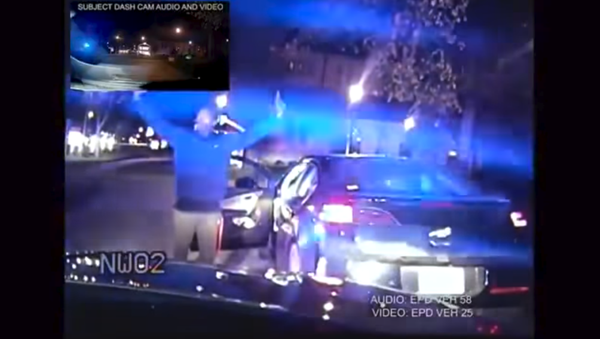 Lawrence Crosby, a former graduate student at Illinois' Northwestern University, is tackled by Evanston police after he is accused of stealing his own car. Lawrence Crosby, a former graduate student at Illinois' Northwestern University, is tackled by Evanston police after he is accused of stealing his own car. - Sputnik International