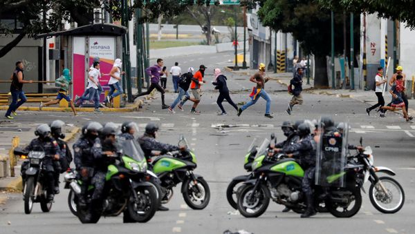 Police secure the area during a protest against Venezuelan President Nicolas Maduro's government in Caracas, Venezuela January 23, 2019. Police secure the area during a protest against Venezuelan President Nicolas Maduro's government in Caracas, Venezuela January 23, 2019. - Sputnik International