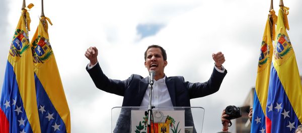 Juan Guaido, President of Venezuela's National Assembly, reacts during a rally against Venezuelan President Nicolas Maduro's government and to commemorate the 61st anniversary of the end of the dictatorship of Marcos Perez Jimenez in Caracas, Venezuela January 23, 2019 - Sputnik International