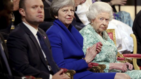 Britain's Queen Elizabeth II, Britain's Prime Minister Theresa May, center, and Prime Minister of Malta Joseph Muscat, left, attend the formal opening of the Commonwealth Heads of Government Meeting in the ballroom at Buckingham Palace in London, Thursday April 19, 2018. - Sputnik International