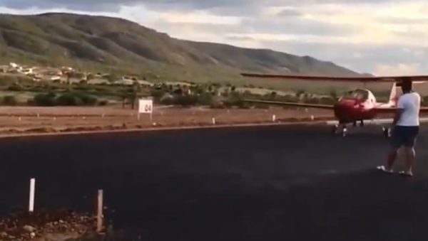 Small Plane Hits Man - Sputnik International