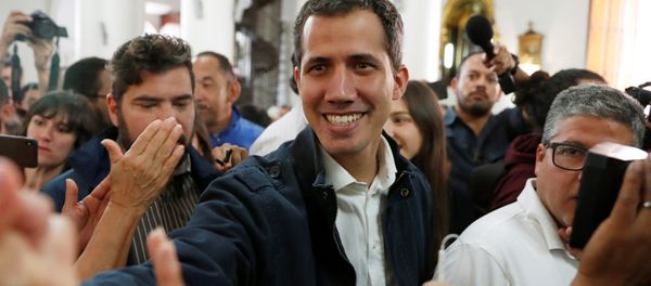 Venezuelan opposition leader and self-proclaimed interim president Juan Guaido arrives to attend a holy mass in Caracas, Venezuela, January 27, 2019 - Sputnik International