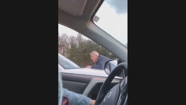 Road rage incident in Massachusetts leaves one driver clinging for life on car hood. - Sputnik International