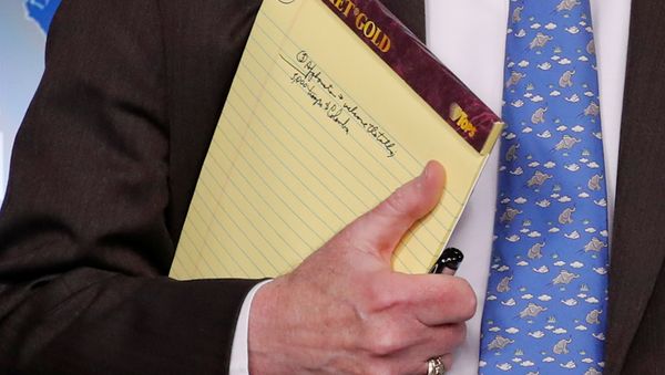 U.S. National Security Adviser John Bolton holds a writing pad with a written note that reads 5,000 troops to Colombia, while he waits to address reporters, as the Trump administration announces economic sanctions against Venezuela and the Venezuelan state owned oil company Petroleos de Venezuela (PdVSA) during a press briefing at the White House in Washington, U.S., January 28, 2019 U.S. National Security Adviser John Bolton holds a writing pad with a written note that reads 5,000 troops to Colombia, while he waits to address reporters, as the Trump administration announces economic sanctions against Venezuela and the Venezuelan state owned oil company Petroleos de Venezuela (PdVSA) during a press briefing at the White House in Washington, U.S., January 28, 2019 - Sputnik International