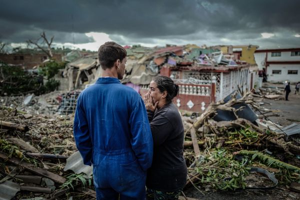 A resident of the tornado-hit Regla neighbourhood cries in front of her destroyed house in Havana A resident of the tornado-hit Regla neighbourhood cries in front of her destroyed house in Havana - Sputnik International