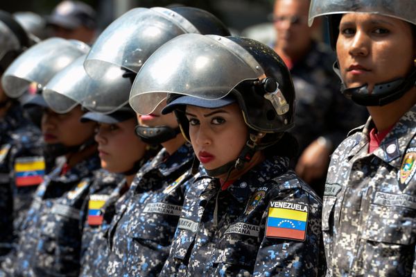 Members of the Bolivarian National Police (PNB) stand guard near the Dr JM de los Rios Children's Hospital in Caracas Members of the Bolivarian National Police (PNB) stand guard near the Dr JM de los Rios Children's Hospital in Caracas - Sputnik International