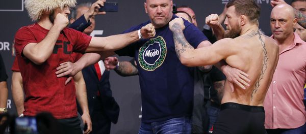 Conor McGregor, right, and Khabib Nurmagomedov face off during a ceremonial weigh-in - Sputnik International