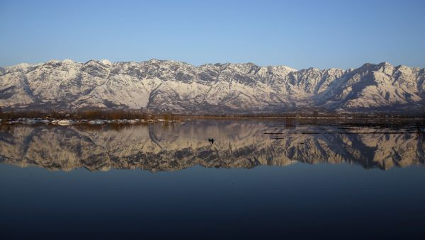 snow-capped mountains are reflected in the Himalayan region of Kashmir on the border between India and Pakistan - Sputnik International