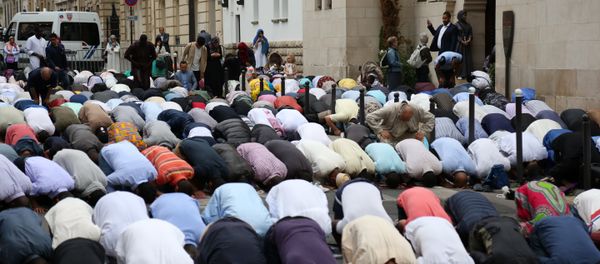Muslims pray in the street outside The Grande Mosque in Paris on August 21, 2018, as they celebrate the first day of the Islamic Festival of Eid al-Adha. Muslims across the world are celebrating the annual festival of Eid al-Adha or the festival of sacrifice which marks the end of the Hajj pilgrimage to Mecca and commemorates prophet Abraham's readiness to sacrifice his son to show obedience to God Muslims pray in the street outside The Grande Mosque in Paris on August 21, 2018, as they celebrate the first day of the Islamic Festival of Eid al-Adha. Muslims across the world are celebrating the annual festival of Eid al-Adha or the festival of sacrifice which marks the end of the Hajj pilgrimage to Mecca and commemorates prophet Abraham's readiness to sacrifice his son to show obedience to God - Sputnik International