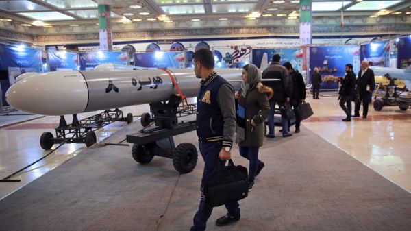 Visitors look at a Hoveizeh 8 cruise missile at a military show marking the 40th anniversary of Iran's Islamic Revolution. Visitors look at a Hoveizeh 8 cruise missile at a military show marking the 40th anniversary of Iran's Islamic Revolution. - Sputnik International